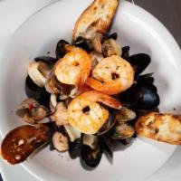 Guazzetto Di Mare E Crostini · P.E.I mussels, vongole (baby clams), sepia, calamari, and shrimp in a light tomato broth ser...