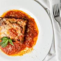 Lasagnetta Spacca Napoli · Layers of sheets of pasta, tomato sauce, mini meatballs, ricotta, fresh mozzarella, basil, a...
