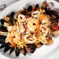 Fresh Scialatielli Alla Scoglio · Fresh scialatielli pasta, vongole (baby clams), shrimp, octopus, P.E.I mussels, calamari, an...