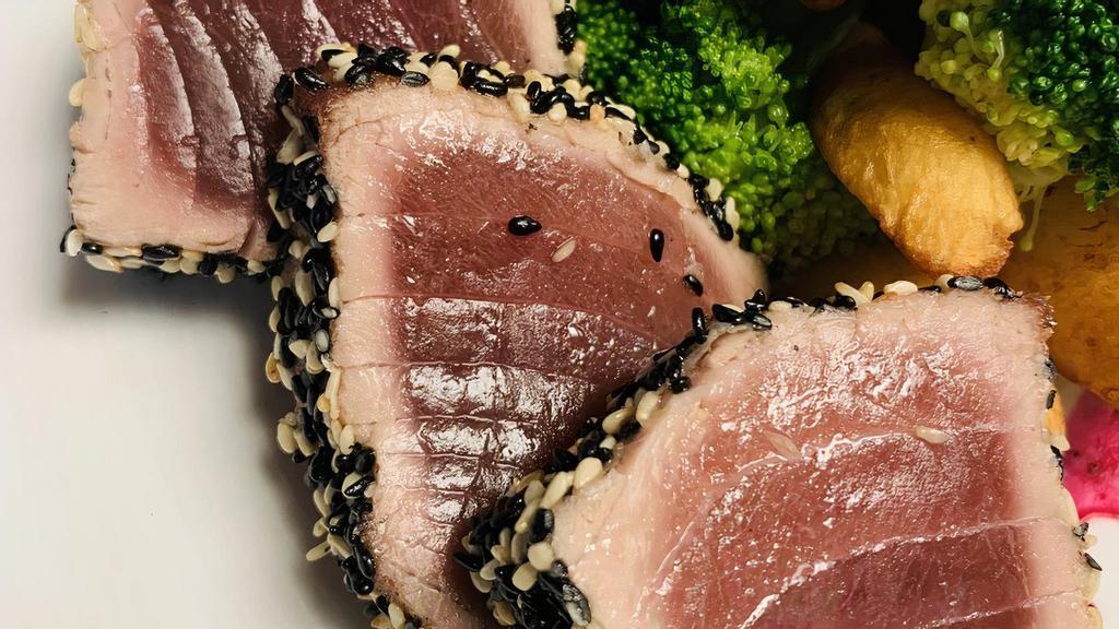 Ahi Tuna · Lightly Grilled Fillet coated with Sesame Seeds