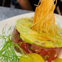 Tuna Tartare · Finely chopped tuna toped with avocado