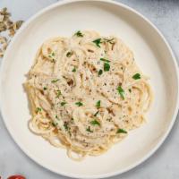 Classic Carbonara · Classic Italian pasta dish made with fresh spaghetti pasta, eggs, Parmigiano-Reggiano cheese...