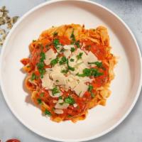 Vodka In Vain Pasta (Fettuccine) · Creamy pink tomato vodka sauce made to order cooked with fettuccine.