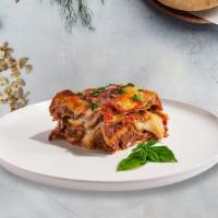 Lala Lasagna · Layers of pasta, ricotta, mozzarella, ground beef, and tomato sauce baked in an oven and top...