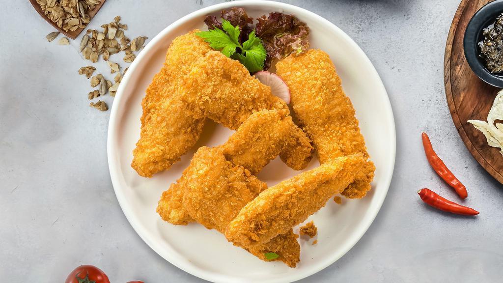 Kid'S Chicken Fingers · Chicken tenders breaded and fried until golden brown.