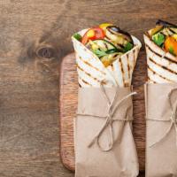 House Vegetarian Wrap Sandwich · Delicious Wrap made with Grilled zucchini, squash, mixed bell peppers, olive with hummus, an...