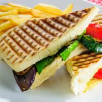 Mediterranean Panini · Grilled Panini Sandwich made with Hummus, olives with roasted peppers, grilled zucchini, egg...