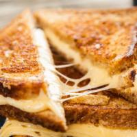 Muenster Grilled Cheese Sandwich · Delicious sandwich made with Muenster cheese, and customer's choice of bread. Topped with bu...