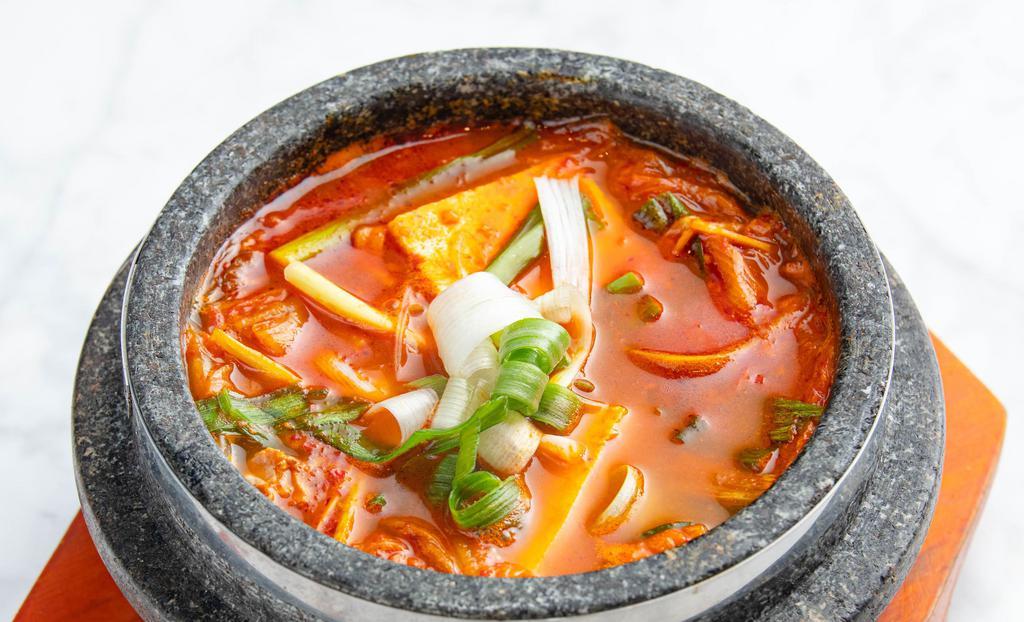 김치찌개 Kimchi Stew · 24oz. Kimchi, vegetables, tofu, & pork casserole. comes with white rice. spicy