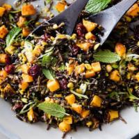 Butternut Squash Wild Rice Bowl · Tender, aromatic wild rice topped with roasted butternut squash and our special seasonings.