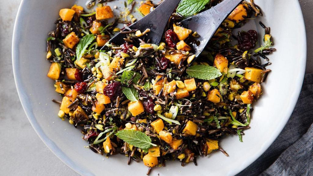 Butternut Squash Wild Rice Bowl · Tender, aromatic wild rice topped with roasted butternut squash and our special seasonings.