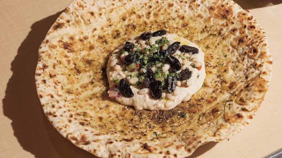 White Bean Hummus · Grilled flatbread, olives