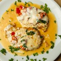 Chicken Alla Roma Dinner · Egg-battered and sautéed in a wine butter lemon sauce topped with mozzarella and fresh tomat...