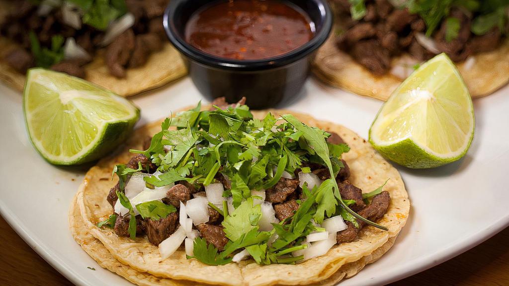 5 X Tacos De Bistec - Beef Fajita · 5 Tacos. Fan favorite classic Beef Fajita Taco from your neighborhood Taqueria!
Authentic street tacos with beef fajita served on corn tortillas with a wedge of lime, cilantro, onion and salsa on the side.