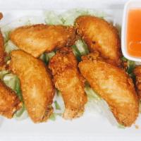 Fried Chicken Wings · Four pieces.