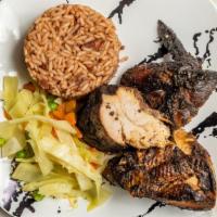 Jerk Chicken · Served with rice, vegetables, and plantain.