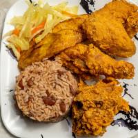 Fried Chicken · Served with rice, vegetables, and plantain.