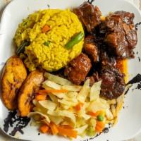 Oxtail · Served with rice, vegetables, and plantain.