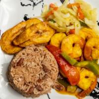 Curried Shrimp · Served with rice, vegetables, and plantain.