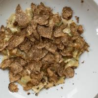 Raviolini Al Tartufo · Ravioli with fresh truffle.