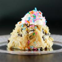 Cookie Dough Scoops · Chocolate chip cookie dough scoop with frostings and toppings.