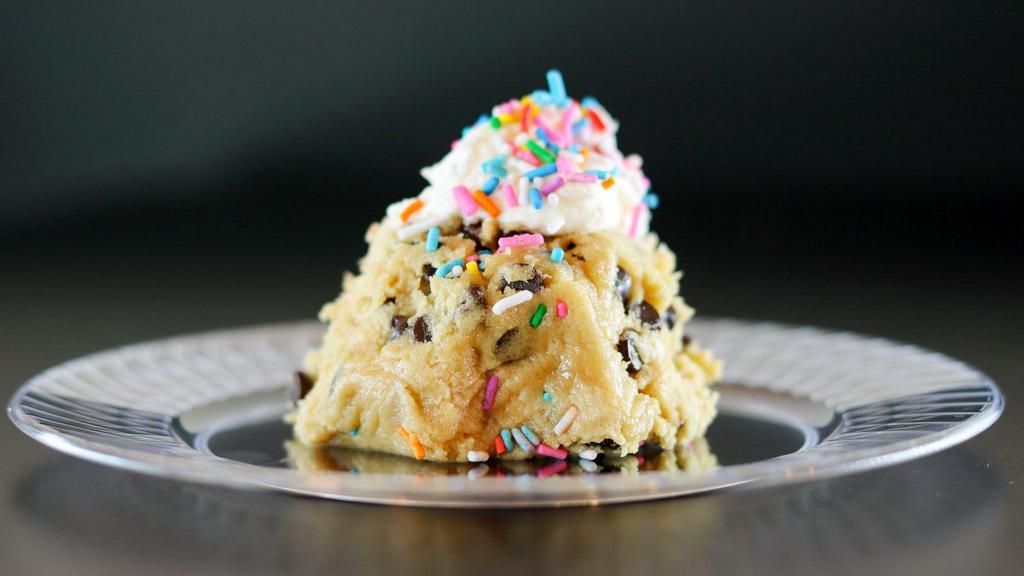 Cookie Dough Scoops · Chocolate chip cookie dough scoop with frostings and toppings.