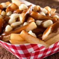 Disco Fries With Melted Gravy · Perfectly fried potatoes topped with melted gravy.