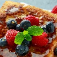 Classic Challah French Toast · Delicious French toast cooked to perfection with a drizzle of cinnamon.