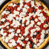 Lrg Margherita Pizza · Sundried tomatoes, marinara sauce, fresh mozzarella and basil with a sesame seed crust.