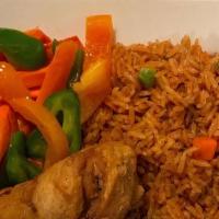 Jollof Rice And Chicken · Rice cooked in tomato sauce and fried chicken