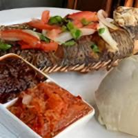 Banku And Fried Fish · seasoned to perfection fried tilapia