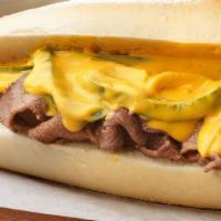 Philly Cheese Steak · Thinly Sliced, Sautéed Rib Eye Beef, Melted Cheese on a Hero with Onion, Green Pepper, Mayon...