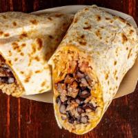 Gonzo Burrito · Grilled chicken or steak, pico de gallo, black or pinto beans, Mexican rice, and hoł or mild...