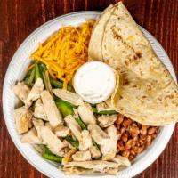 Chicken Fajita · Grilled chicken or steak over a bed of onions and peppers, served with cheddar cheese, sour ...