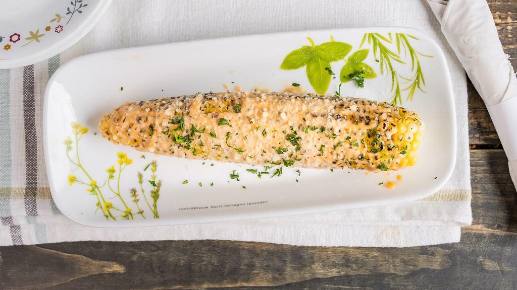 Corn On The Cob · Spicy mayo and parmesan cheese.