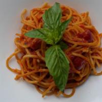 Spaghetti Chitarra Al Pomodoro E Basilico · Fresh cherry tomato, garlic and basil sauce.