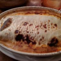 Cannelloni Al Forno · With bechamel, Parmigiano and short ribs ragu.