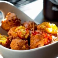 Sweet Corn Fritters · served with Honey-Chile dipping sauce
