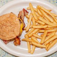 Rockville Center Burger · Cheddar cheese, bacon and BBQ sauce with french fries.