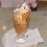 Peanut Butter Cup Sundae · Two scoops of vanilla ice cream covered with hot fudge and smooth peanut butter topping, top...
