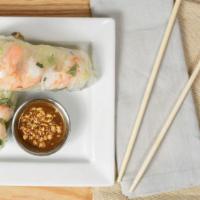 Summer Rolls · Rice paper filled with rice noodles, lettuce, cucumbers, and carrots.