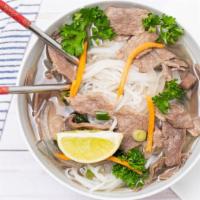 Pho · Beef broth seasoned with anise, with pho rice noodles, fresh herbs, beansprouts, and a wedge...