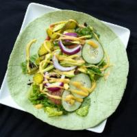 Veggie Delight Wrap · Sliced cucumber, pickles, red onion, sweet peppers, lettuce, tomato and ranch dressing.