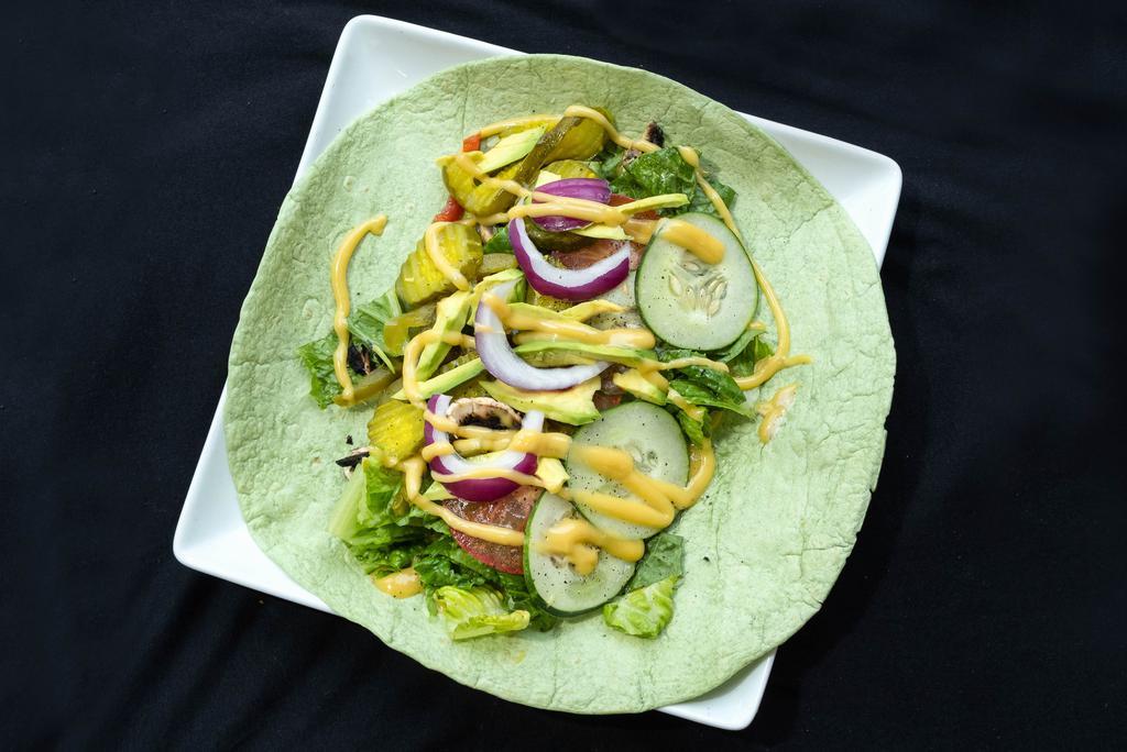 Veggie Delight Wrap · Sliced cucumber, pickles, red onion, sweet peppers, lettuce, tomato and ranch dressing.