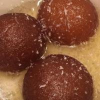 Gulab Jamun · Crisped honey cheese balls dipped in rose flavored syrup.