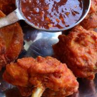 Chicken Lollipops · Chicken wings spicy sambal dip.