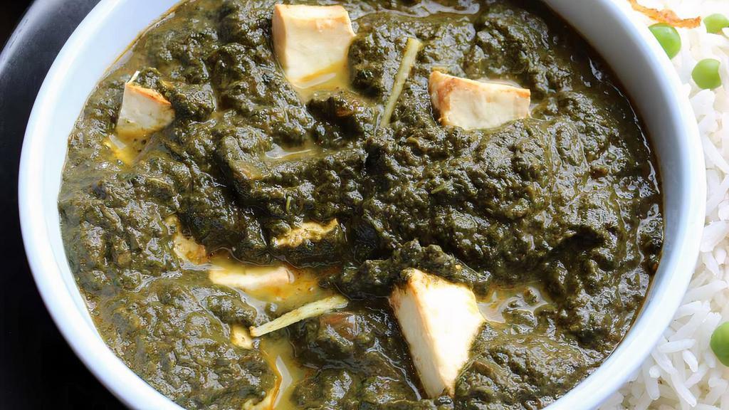 Saag Paneer · Vegetarian. Fresh homemade cheese folded in seasoned and tempered spinach.