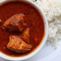 Chicken Chettinad · Spicy chicken curry with black peppercorns, fennel powder and curry leaves.