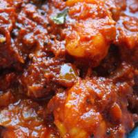 Prawns Balchao · Tempered shrimps sautéed with garam masala. Extra spicy.
