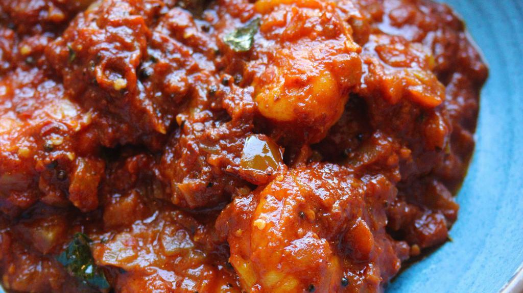 Prawns Balchao · Tempered shrimps sautéed with garam masala. Extra spicy.